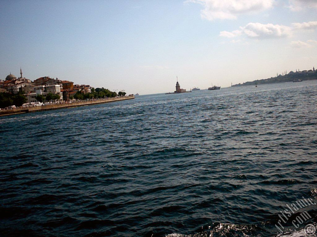 View of Uskudar coast, Kiz Kulesi (Maiden`s Tower) and Sarayburnu coast from the Bosphorus in Istanbul city of Turkey.
