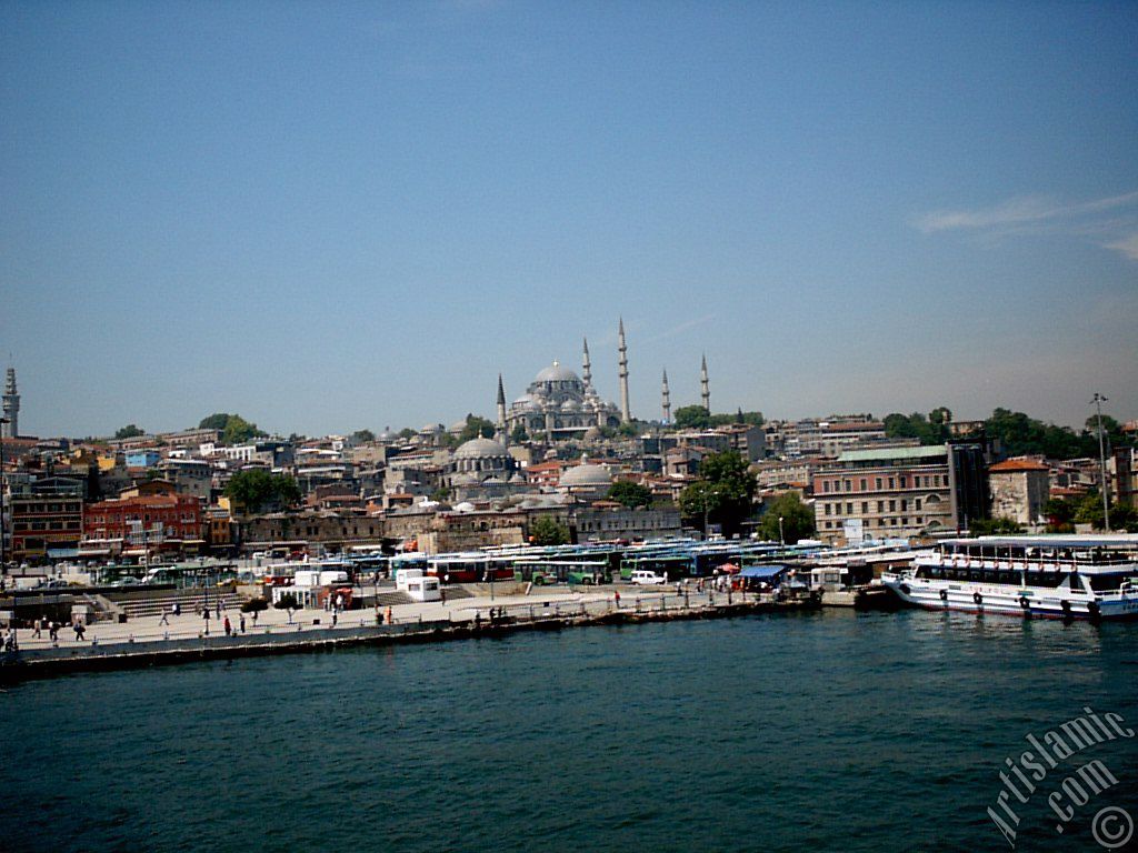 View of coast, (from left) Beyazit Tower, below Rustem Pasha Mosque and above it Suleymaniye Mosque from Galata Bridge located in Istanbul city of Turkey.
